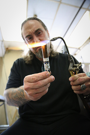 Matt Booth of Room101 Torching a Cigar